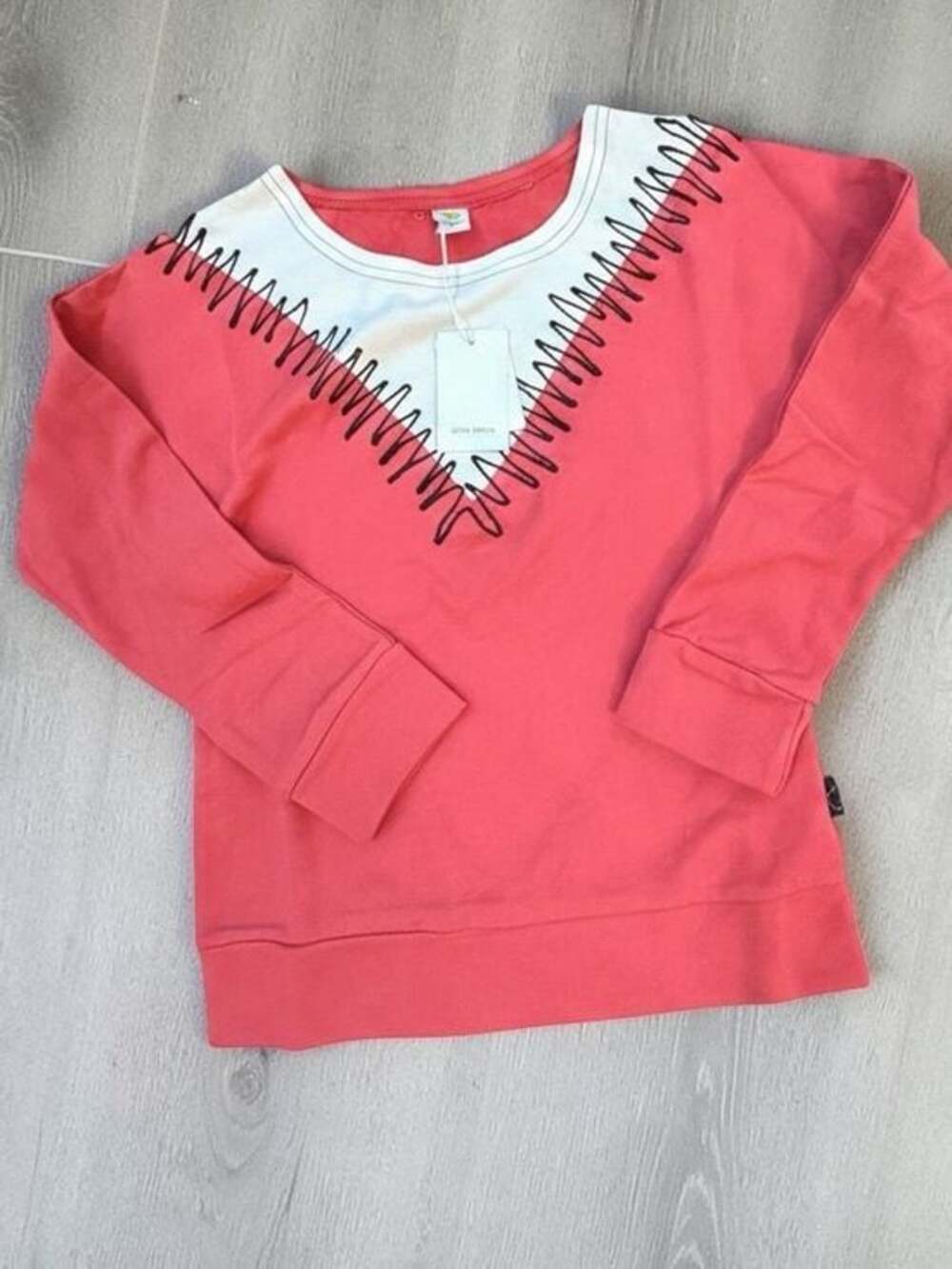 Dino Bebe Coral Sweatshirt with White V-Trim and Black Stitching